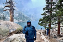 Posing with my back to the wind at Emerald Lake