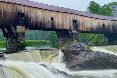 Water flowing under the Bath Covered Bridge in Bath, NH