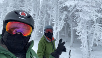 Skiers on frozen Summit of Stratton Mountain