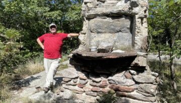 standing next to the chimney on Nottingham Mt